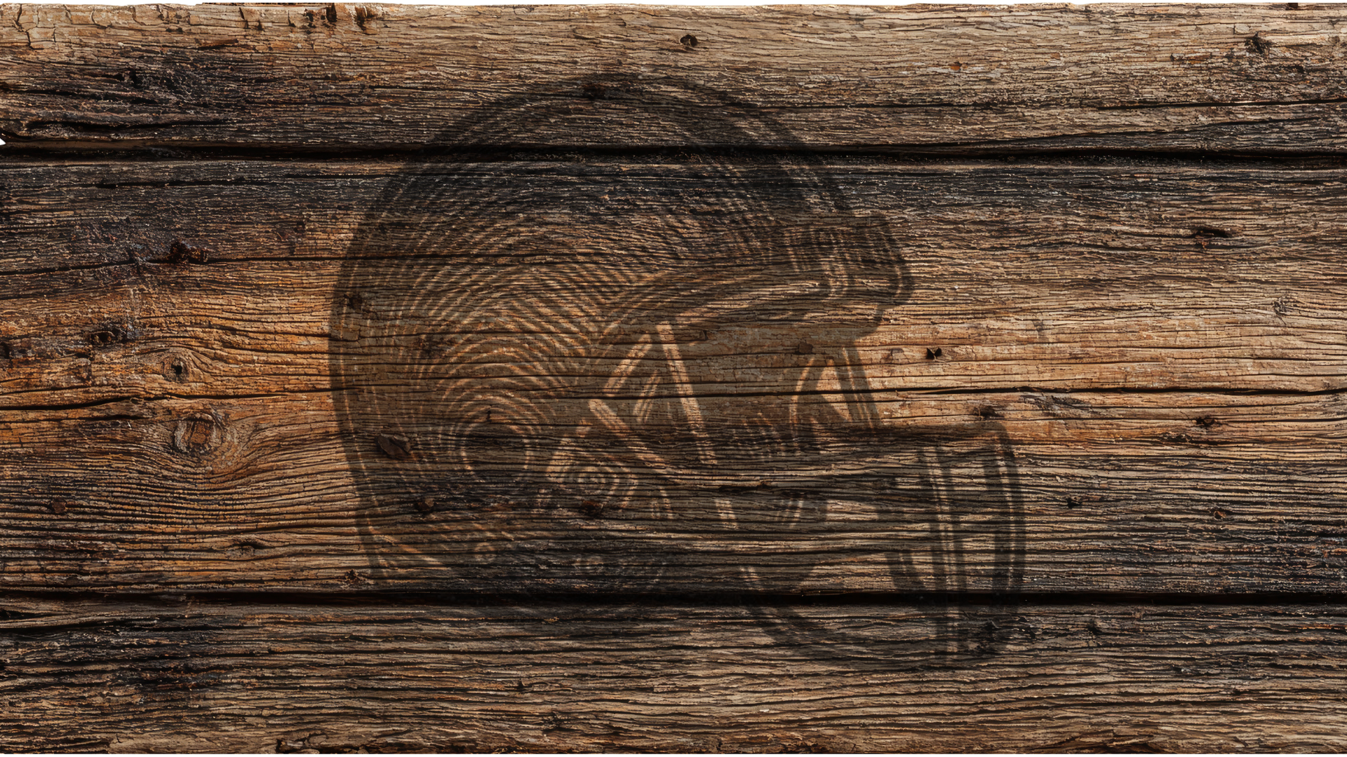 A rustic engraved design of a football helmet on weathered brown wooden planks.