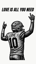 Black and white graphic print featuring a football player from behind with raised hands, wearing a jersey that says 'LOVE' and number '10'. Above the player, the text reads 'LOVE IS ALL YOU NEED' in bold capital letters.