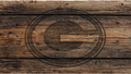 Rustic brown wooden plank background with visible grain, knots, and a dark circular watermark overlay.